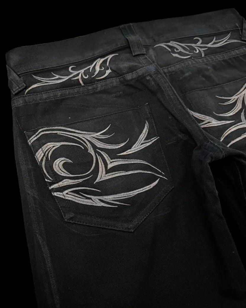 "TRIBAL" FLARED WAXED DENIM